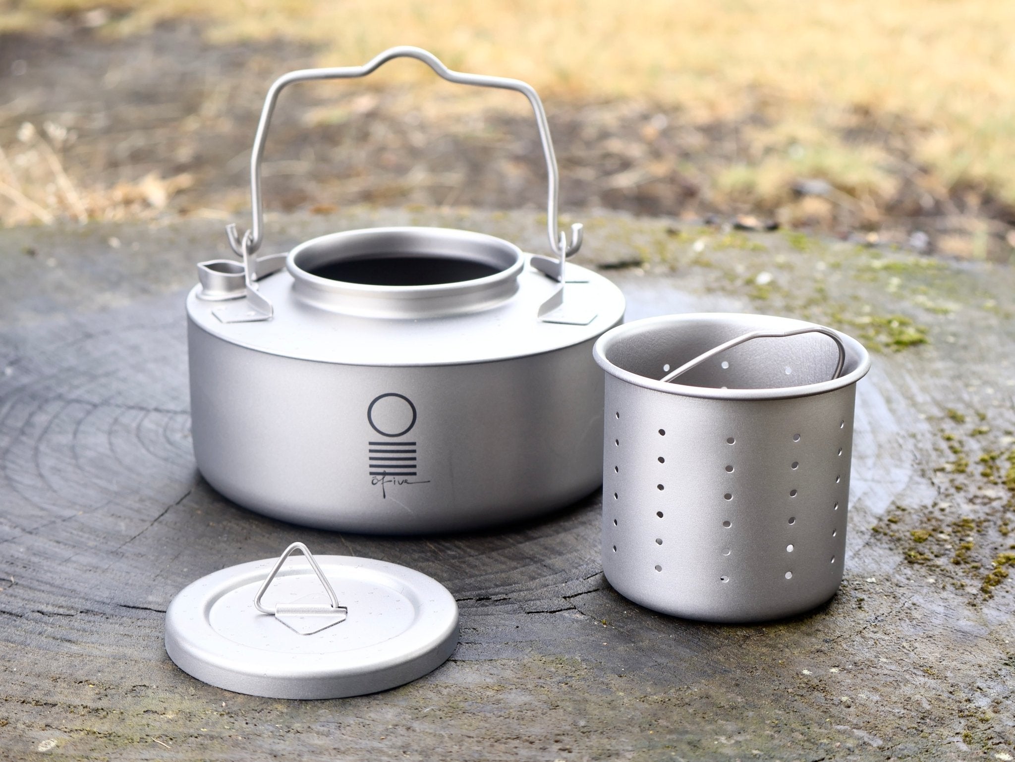 Ultra-light titanium kettle with removable tea strainer for loose leaf tea brewing and outdoor tea rituals